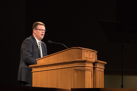 President Gilbert speaks to students during devotional.