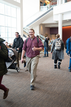 Students leave devotional after listening to President and Sister Gilbert speak.