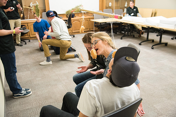 Students of BYU-Idaho participate in "Minute to Win It" Games.