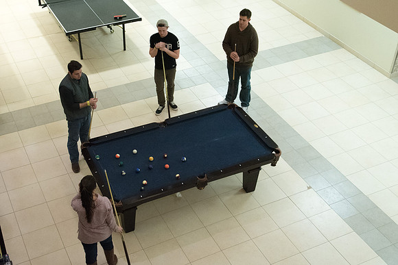 Students of BYU-Idaho play pool at I-Night.