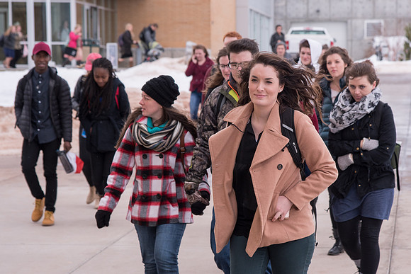 Students around campus going to devotional.