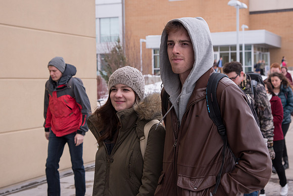 Students around campus going to devotional.