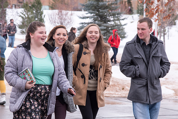 Students around campus going to devotional.