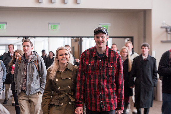 Students around campus going to devotional.