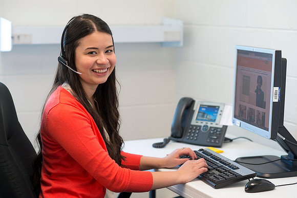 Students help take calls in the Pathway Support Center.