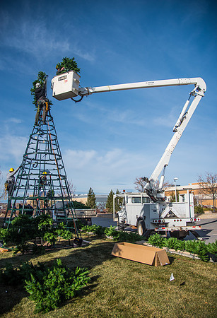 The BYU-Idaho ground keeping crew set up a christmas tree in front of the Taylor chapel. Fall Semester.