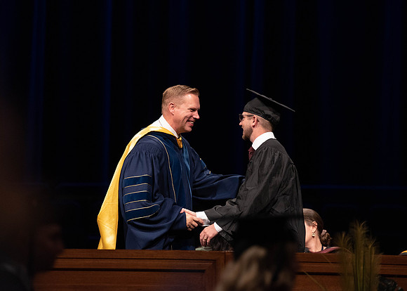 Students graduating from College of Agriculture and Life Sciences. Convocation in the BYU-Idaho Center.