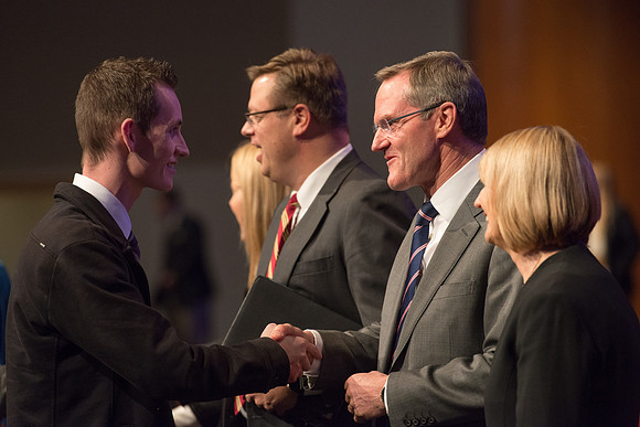 Elder Peter Meurs of the Quorum of the Seventy greets students after Devotional in the BYU-Idaho Center.