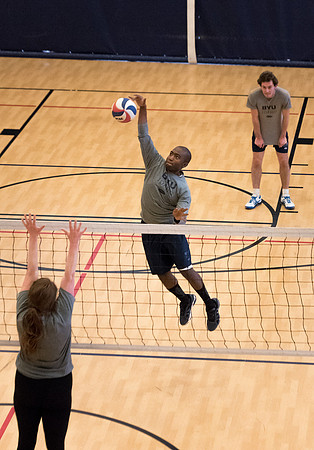 Students play volleyball in class in the BYU-Idaho Center.