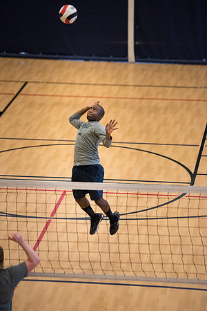 Students play volleyball in class in the BYU-Idaho Center.