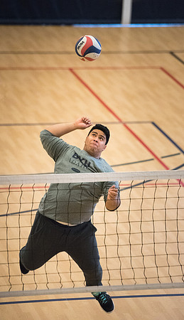 Students play volleyball in class in the BYU-Idaho Center.