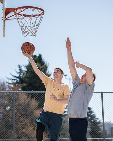 BYU-Idaho Admissions Viewbook. Jacob Kaiser playing basketball. Spring Semester