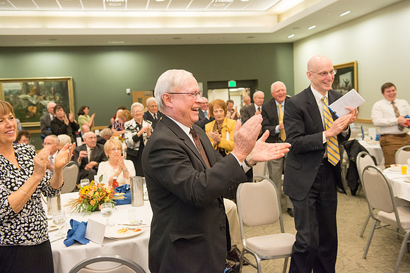 Ricks College Alumni gather to honor John and Trudy Bidwell at an Emeritus Breakfast.