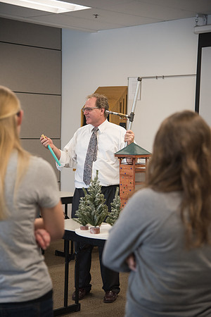 Students work alongside Brother Steve Kugath in the Facility Management class in the Health, Recreation, and Human Performance Department.