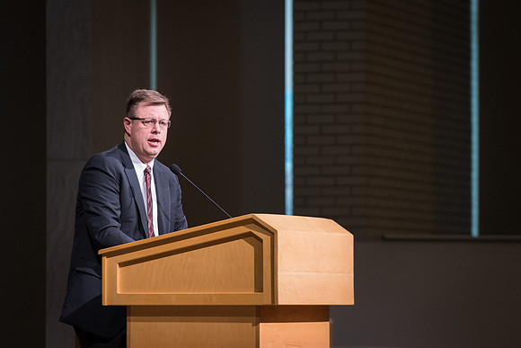 President Gilbert welcomes employees to the conference and introduces keynote speaker, Benson Porter.