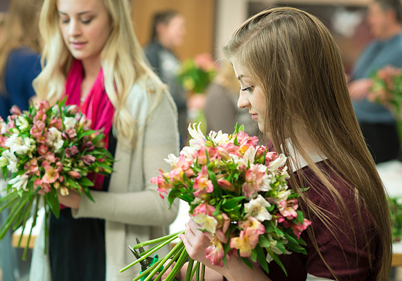 Students in Ben Romney's Floral Design class practice making bouquets.