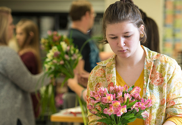 Students in Ben Romney's Floral Design class practice making bouquets.