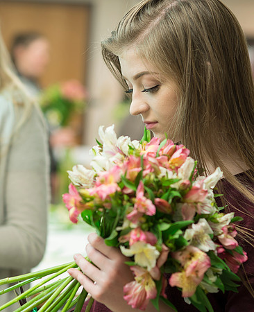 Students in Ben Romney's Floral Design class practice making bouquets.