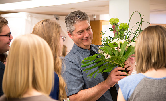 Students in Ben Romney's Floral Design class practice making bouquets.