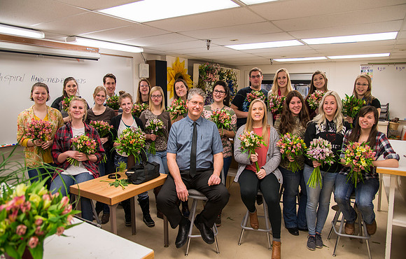 Students in Ben Romney's Floral Design class practice making bouquets.