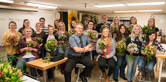 Students in Ben Romney's Floral Design class practice making bouquets.