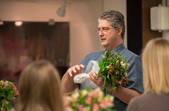 Students in Ben Romney's Floral Design class practice making bouquets.