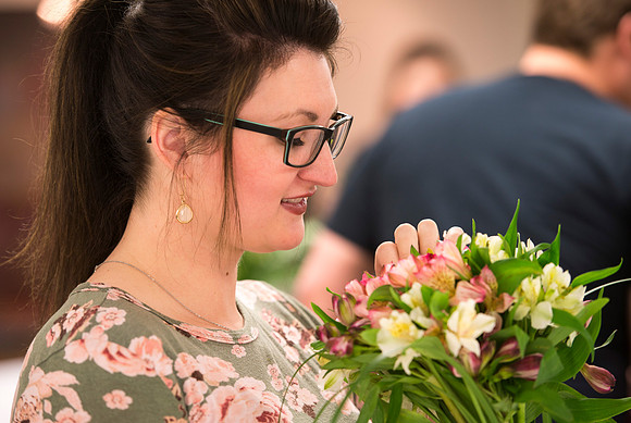 Students in Ben Romney's Floral Design class practice making bouquets.