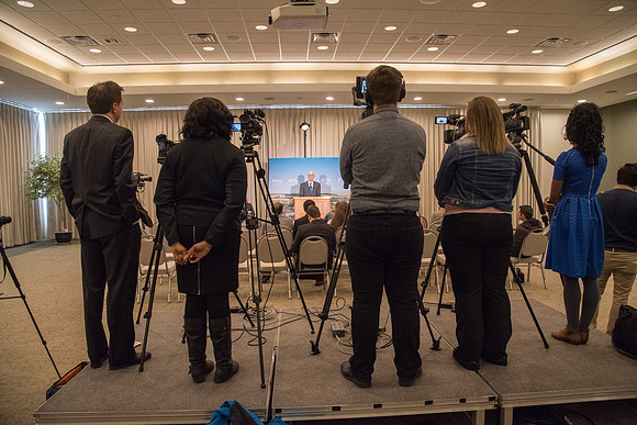 President Clark G. Gilbert and President Henry J. Eyring answer questions at a press conference.