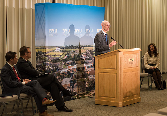 President Clark G. Gilbert and President Henry J. Eyring answer questions at a press conference.