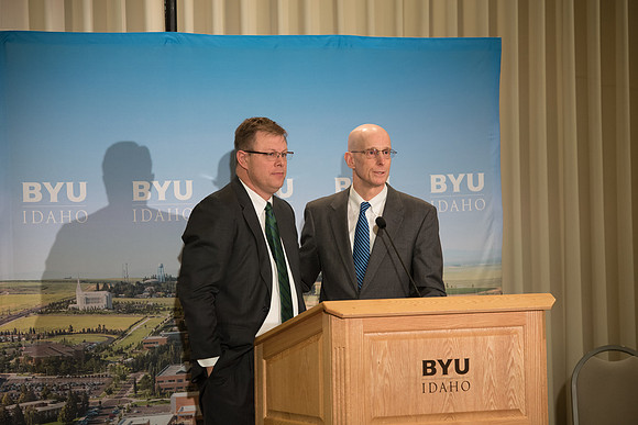 President Clark G. Gilbert and President Henry J. Eyring answer questions at a press conference.
