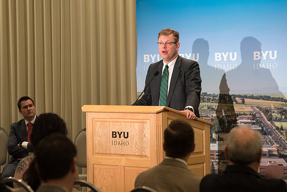 President Clark G. Gilbert and President Henry J. Eyring answer questions at a press conference.