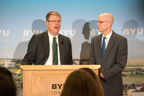 President Clark G. Gilbert and President Henry J. Eyring answer questions at a press conference.