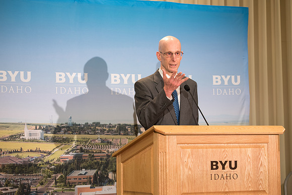 President Clark G. Gilbert and President Henry J. Eyring answer questions at a press conference.
