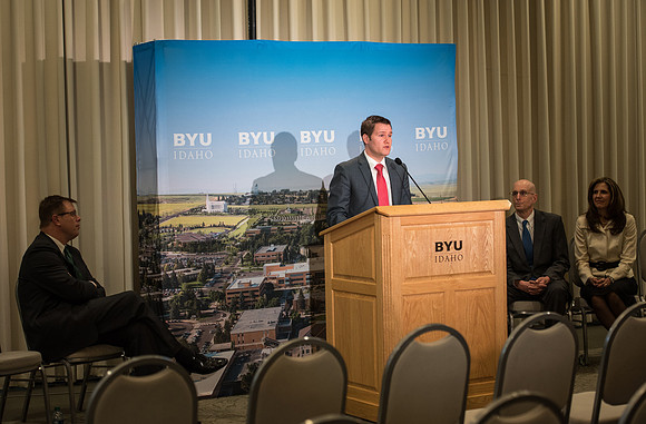 President Clark G. Gilbert and President Henry J. Eyring answer questions at a press conference.