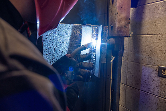 Students working in the welding lab.