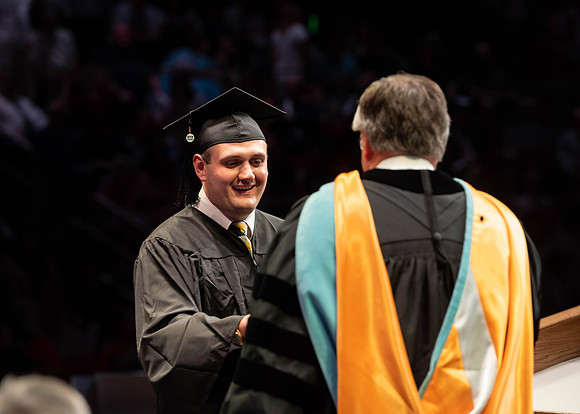 Students graduate from College of Physical Sciences and Engineering. Convocation held in the Hart Building Auditorium.