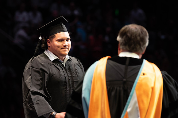Students graduate from College of Physical Sciences and Engineering. Convocation held in the Hart Building Auditorium.