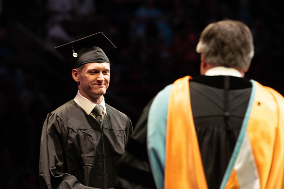 Students graduate from College of Physical Sciences and Engineering. Convocation held in the Hart Building Auditorium.