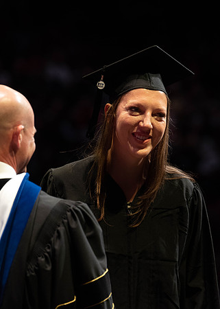 Students graduate from College of Physical Sciences and Engineering. Convocation held in the Hart Building Auditorium.