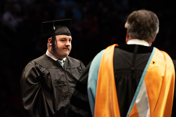 Students graduate from College of Physical Sciences and Engineering. Convocation held in the Hart Building Auditorium.