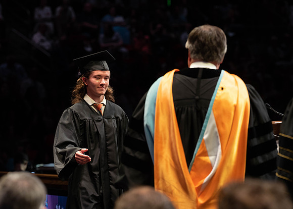 Students graduate from College of Physical Sciences and Engineering. Convocation held in the Hart Building Auditorium.