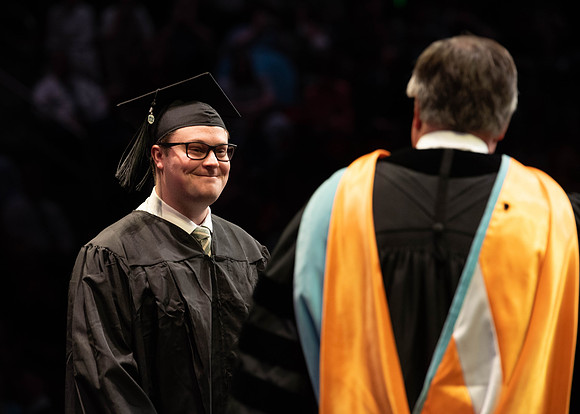 Students graduate from College of Physical Sciences and Engineering. Convocation held in the Hart Building Auditorium.