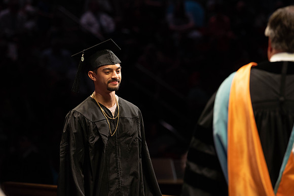 Students graduate from College of Physical Sciences and Engineering. Convocation held in the Hart Building Auditorium.