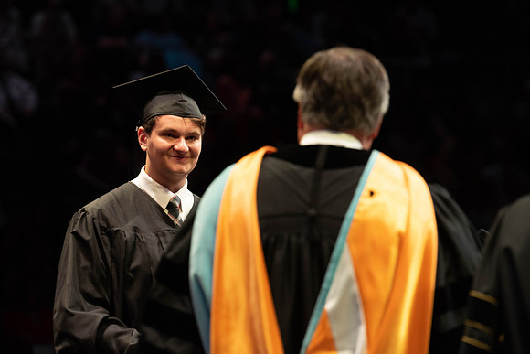 Students graduate from College of Physical Sciences and Engineering. Convocation held in the Hart Building Auditorium.