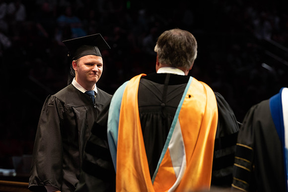 Students graduate from College of Physical Sciences and Engineering. Convocation held in the Hart Building Auditorium.
