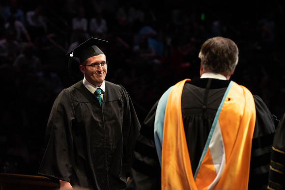 Students graduate from College of Physical Sciences and Engineering. Convocation held in the Hart Building Auditorium.
