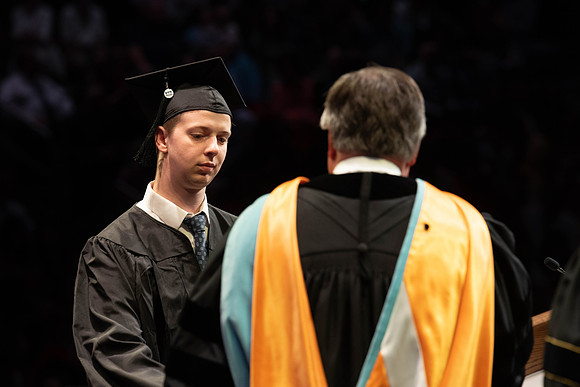 Students graduate from College of Physical Sciences and Engineering. Convocation held in the Hart Building Auditorium.