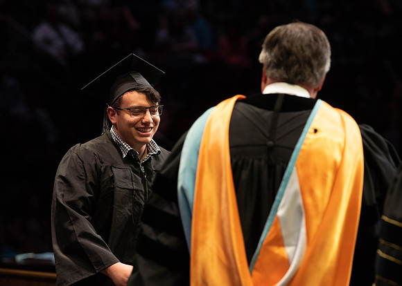 Students graduate from College of Physical Sciences and Engineering. Convocation held in the Hart Building Auditorium.
