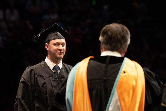 Students graduate from College of Physical Sciences and Engineering. Convocation held in the Hart Building Auditorium.