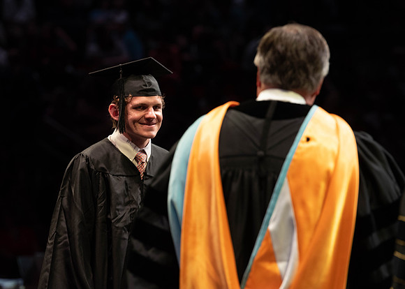 Students graduate from College of Physical Sciences and Engineering. Convocation held in the Hart Building Auditorium.